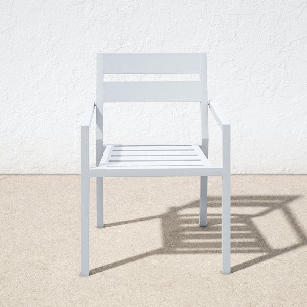 AllModern Gold Metal Outdoor Stackable Dining Armchair Wayfair